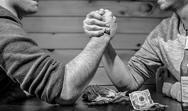 arm wrestle dealing with overly opinionated clients