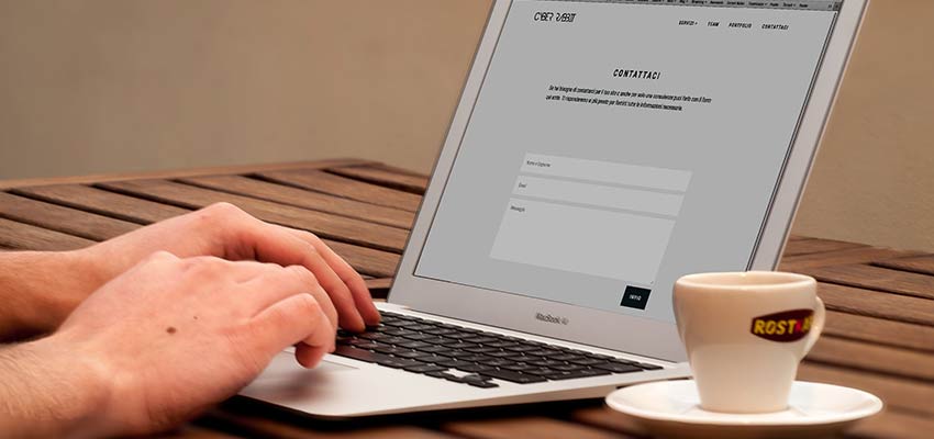 Person filling out a contact form.