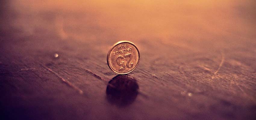 Coin on a wooden floor