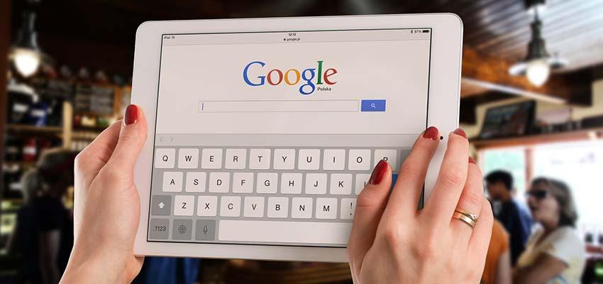 An iPad displaying Google's home page.