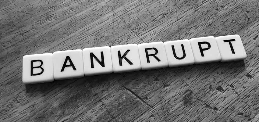 Letter tiles that spell "BANKRUPT".