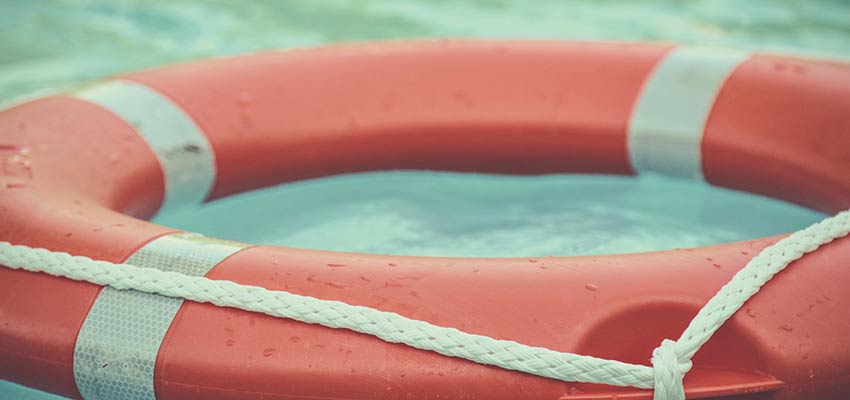 A life preserver floating in water.