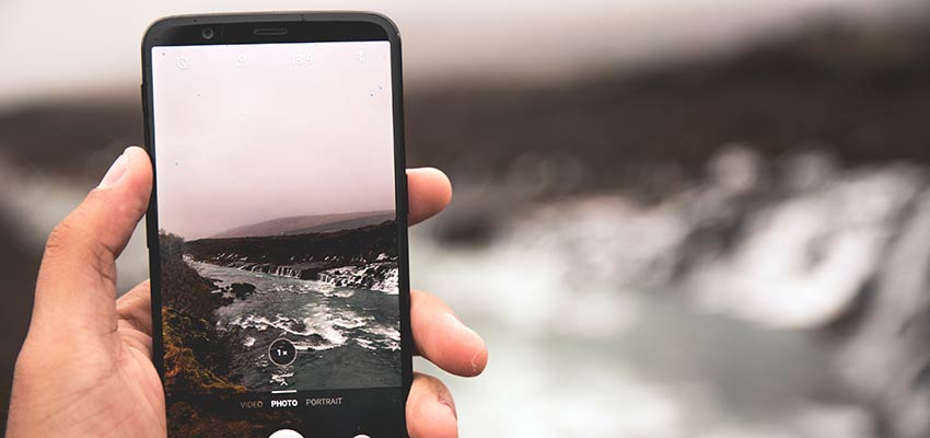 A beach scene displayed on a phone screen.