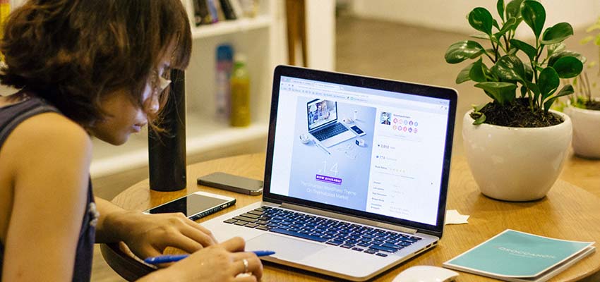 Woman using a laptop computer.