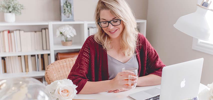Woman sitting at a desk.