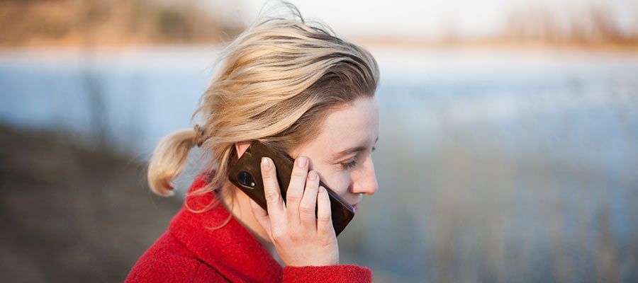 A woman talking on the phone.