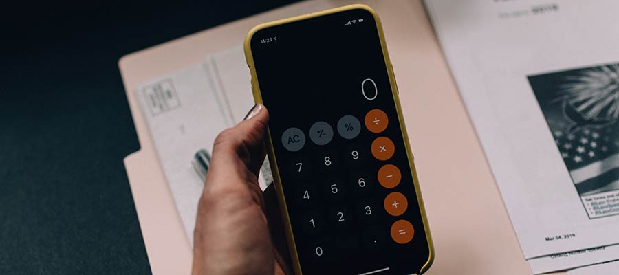 A person holding a mobile phone.
