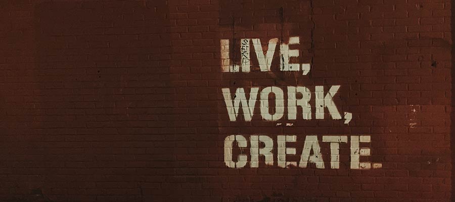 A sign that reads Live, Work, Create